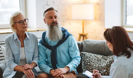 a group of people sitting on a couch