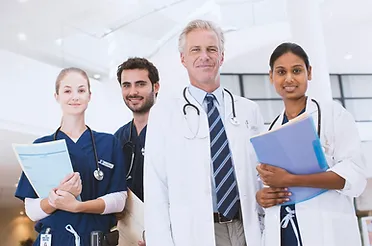 a group of medical professionals posing for a photo