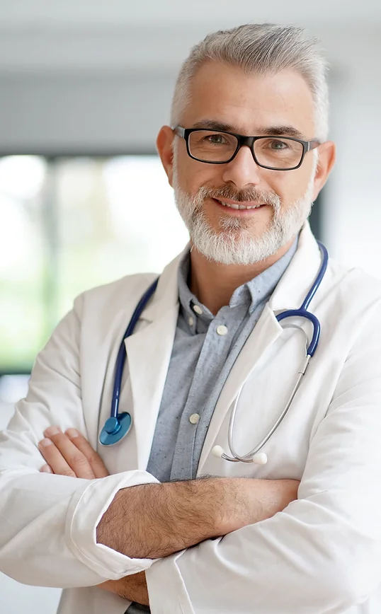 a man with glasses and a stethoscope around his neck