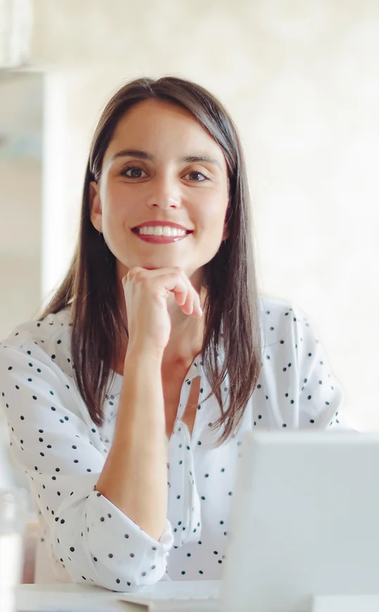 a woman with her chin on her hand