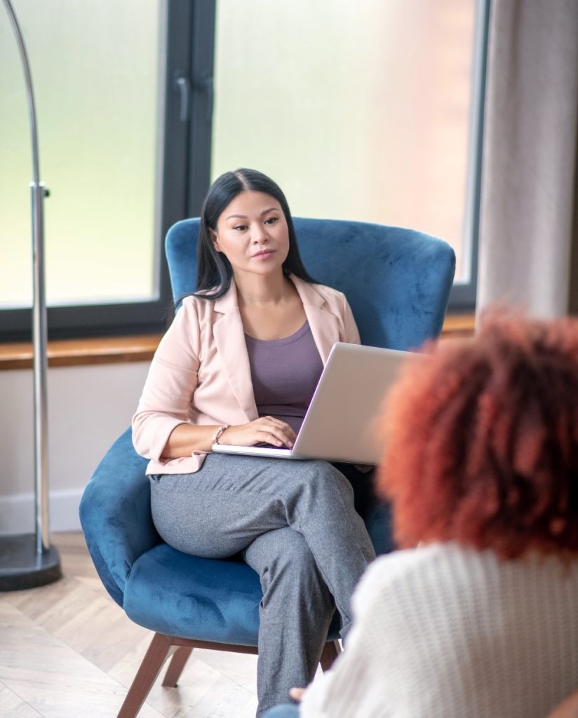 woman meeting with therapist